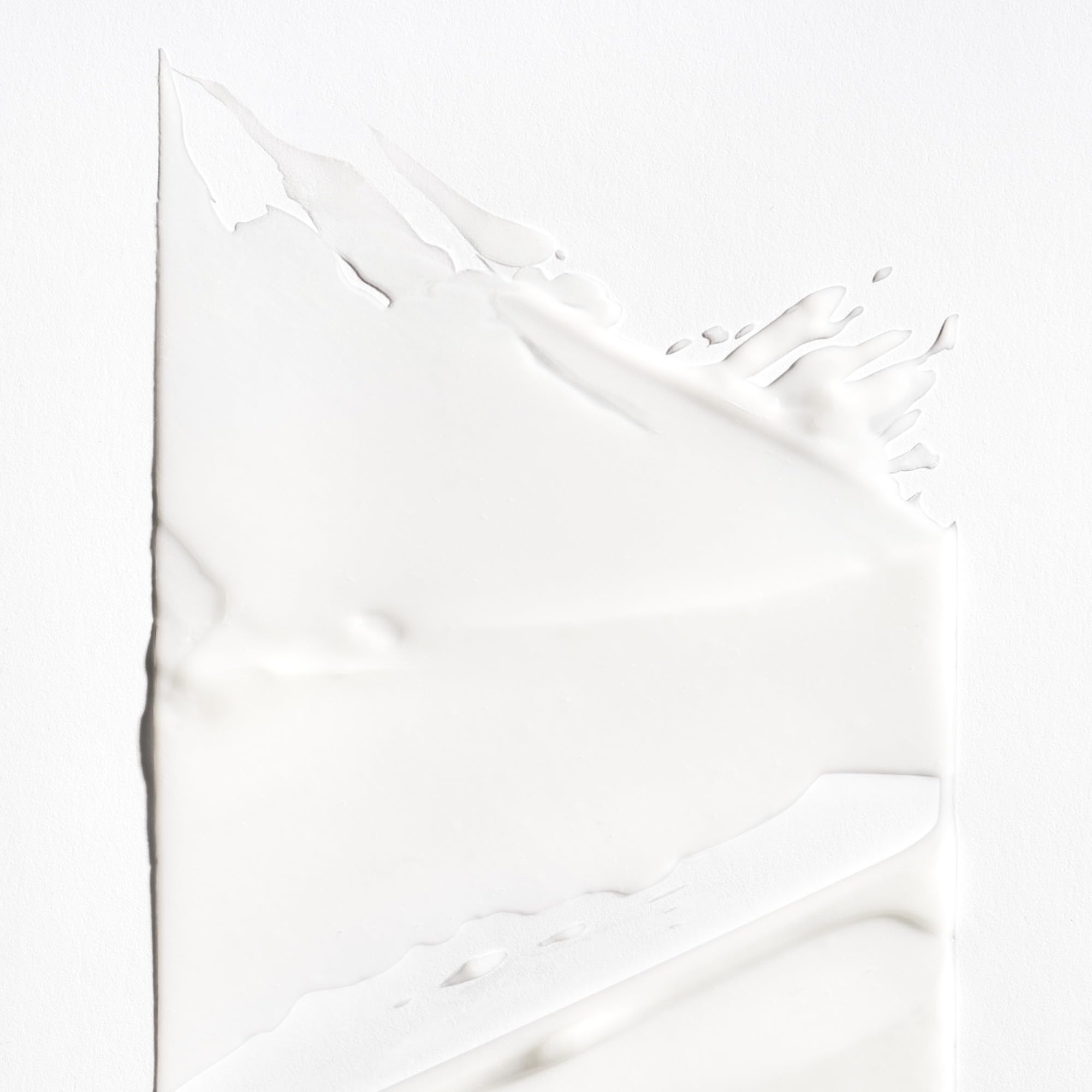 Briogeo Curl Charisma textura del acondicionador para rizos suaves sin pesadez.
