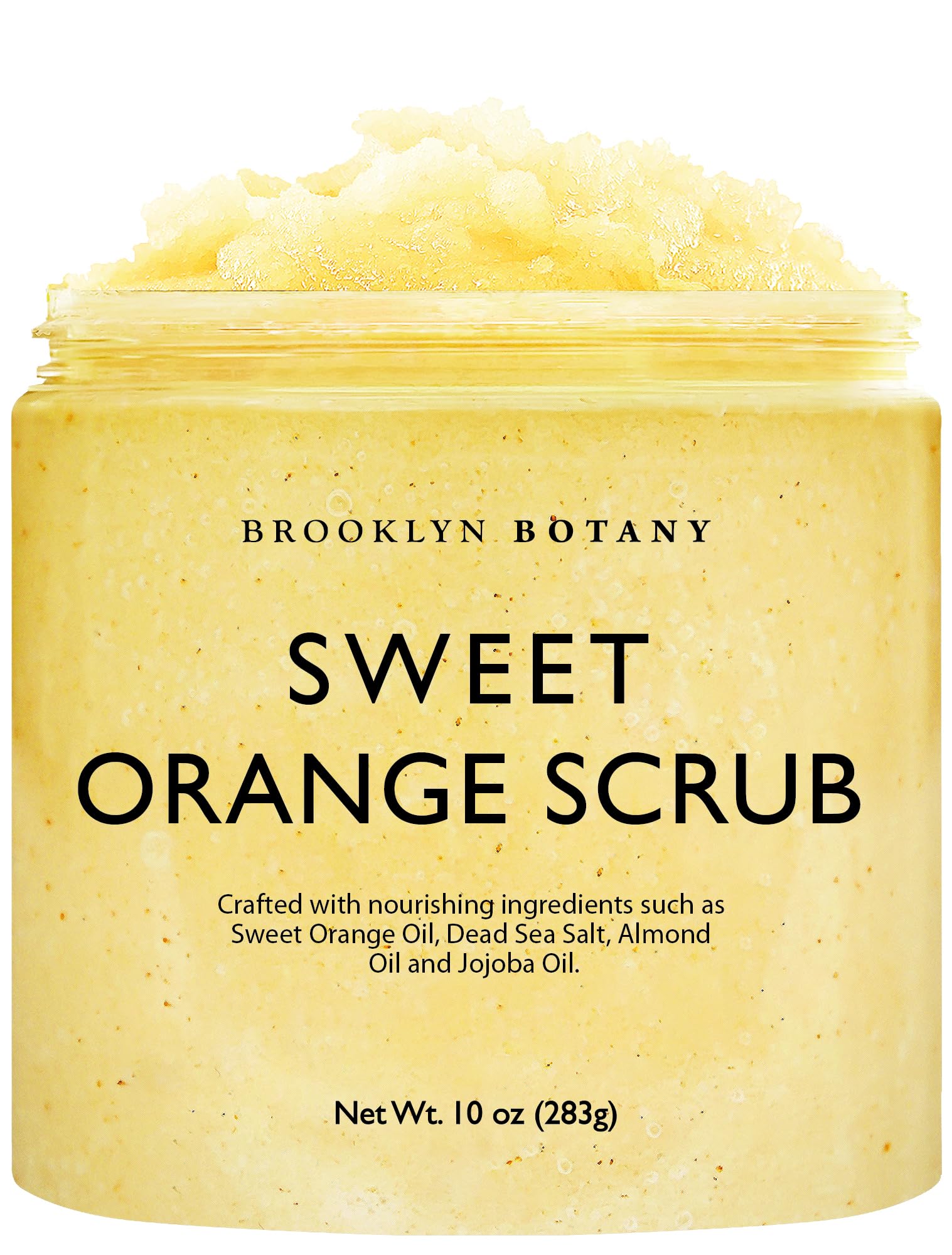 Brooklyn Botany Sweet Orange Scrub, botella vertiendo, exfolia suavemente la piel.