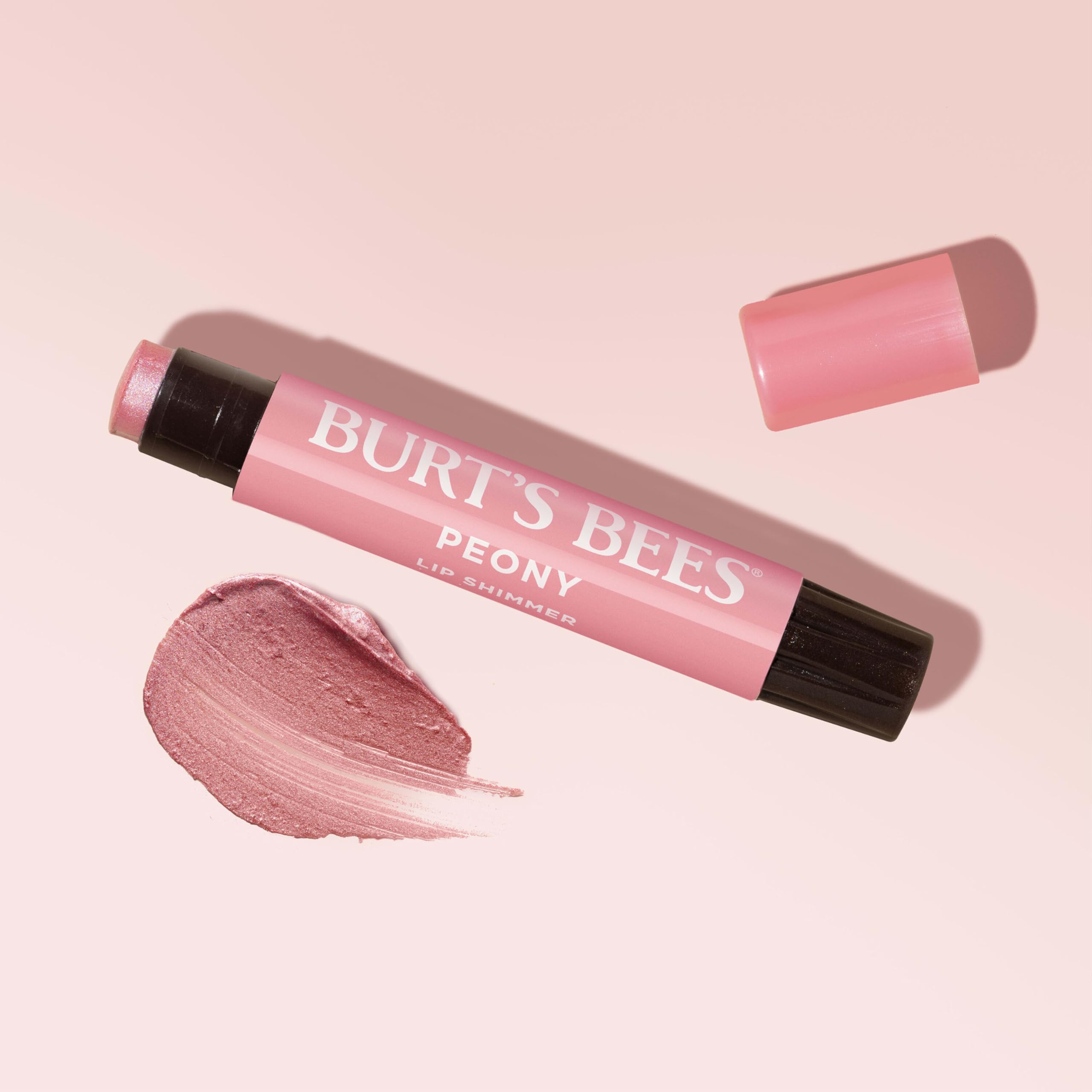 Empaque reciclable del Lip Shimmer Peony para consumo responsable.