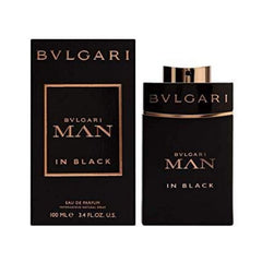 Bvlgari Man in Black, notas iris, perfil sofisticado para salidas nocturnas.