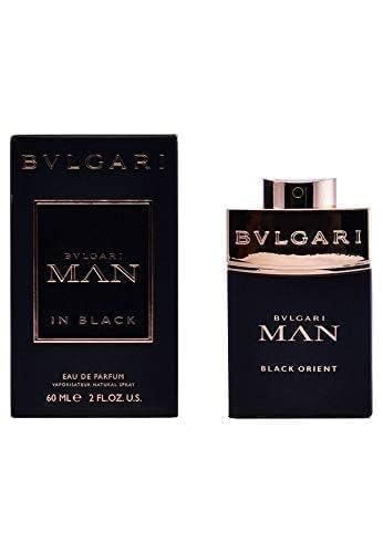Bvlgari Man in Black, notas ron y especias, aroma cálido para invierno.