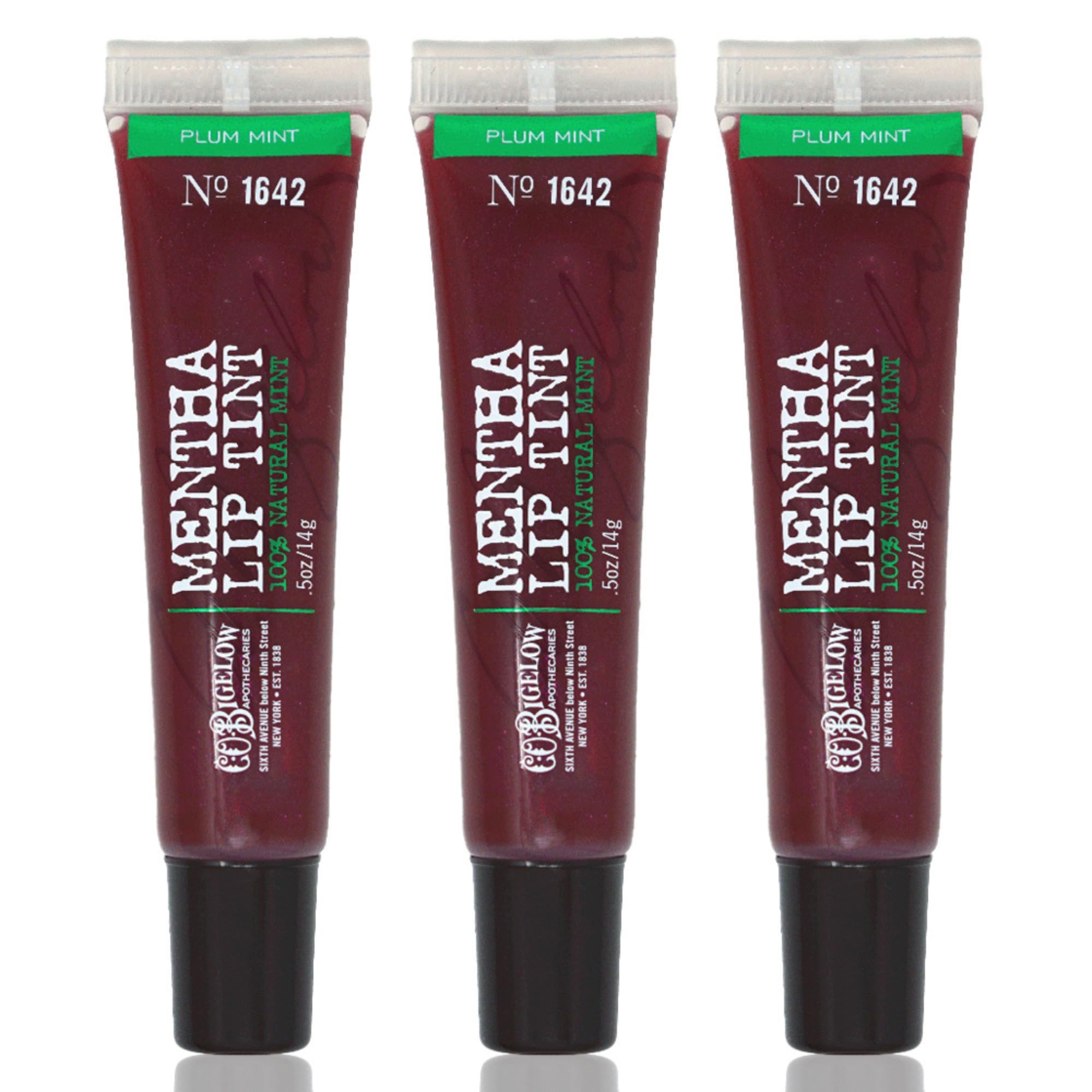 Tres tubos Plum Mentha Lip Tint de C.O. Bigelow para uso práctico en casa.