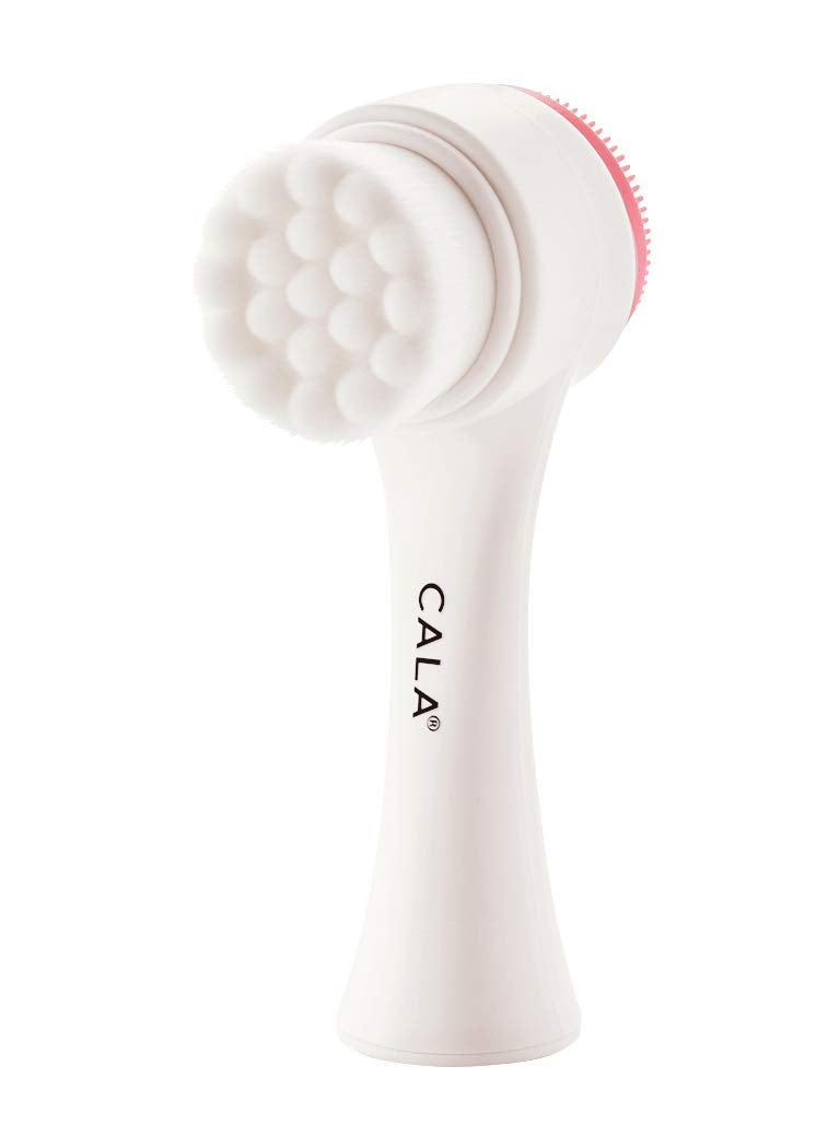 Cepillo facial Cala doble acción con cerdas suaves rosa para limpieza profunda de poros.