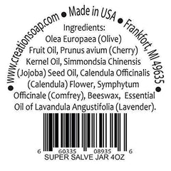Calendula Comfrey Salve de Creation Pharm, aplicación suave en la palma.
