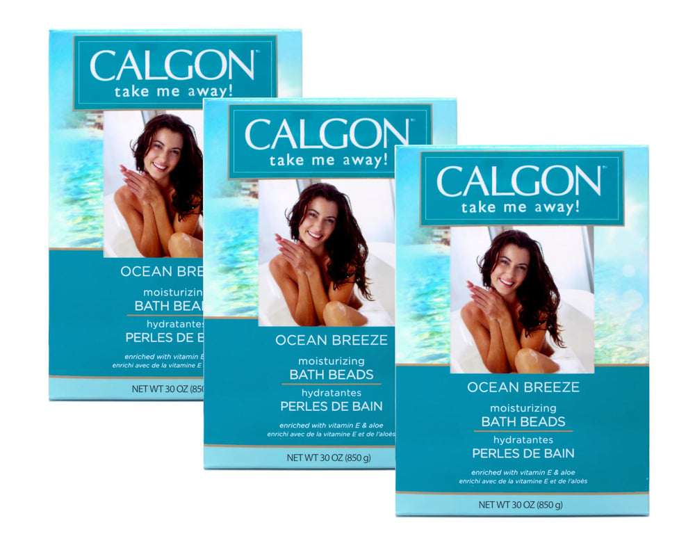 Calgon Ocean Breeze bath beads poured into water for a soothing moisturizing soak.
