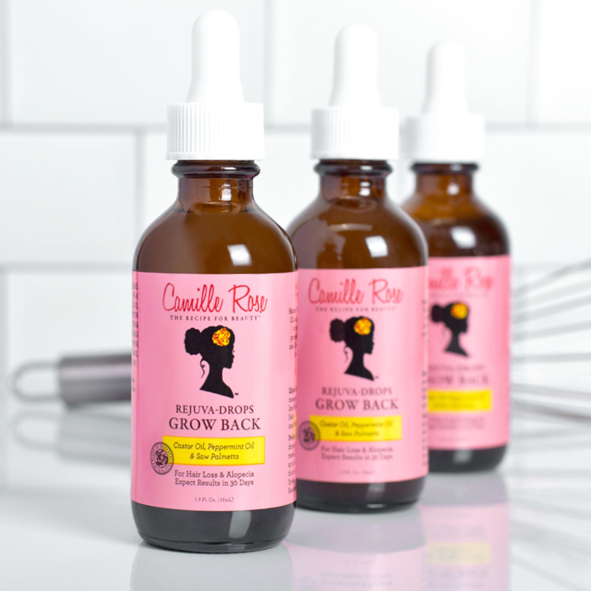 Camille Rose Rejuva Grow Back Drops, aplicación en entradas, masaje suave para absorber.