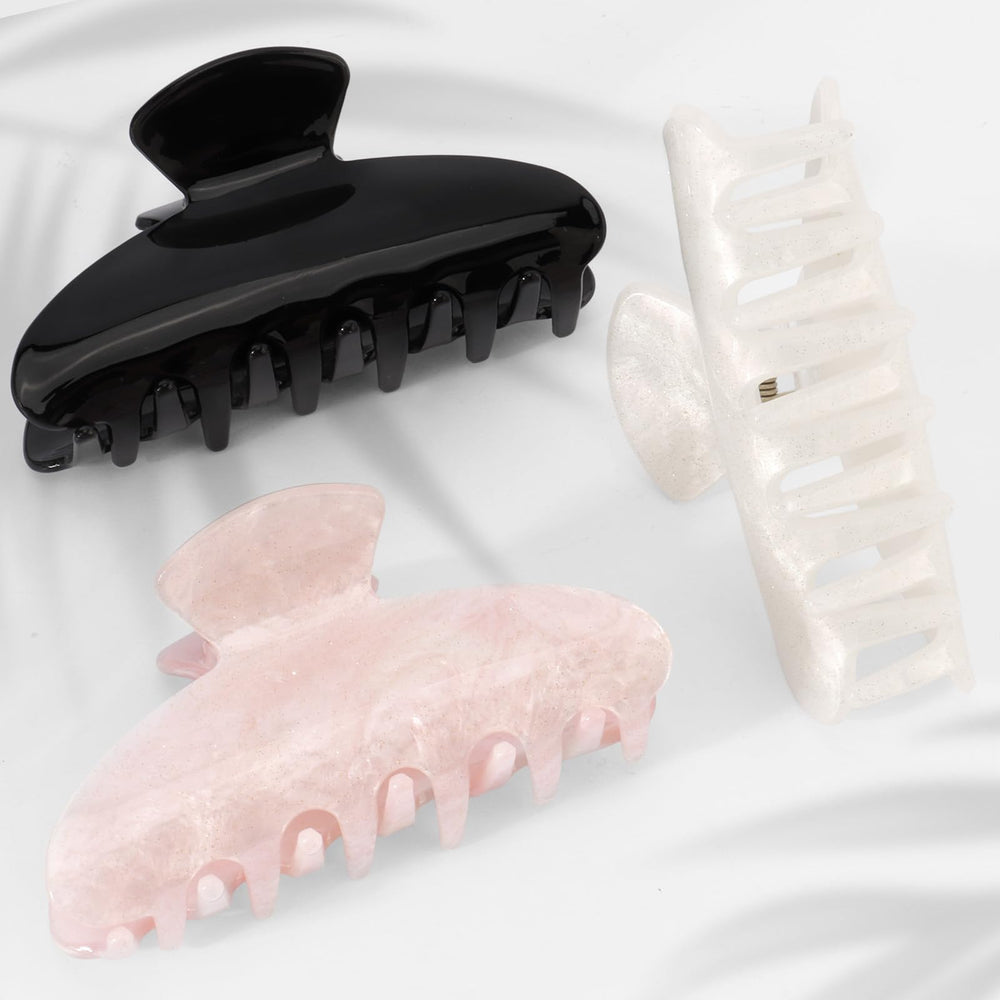 Pinza Canitor acrílica marmolada crema, opción discreta para recogidos elegantes.