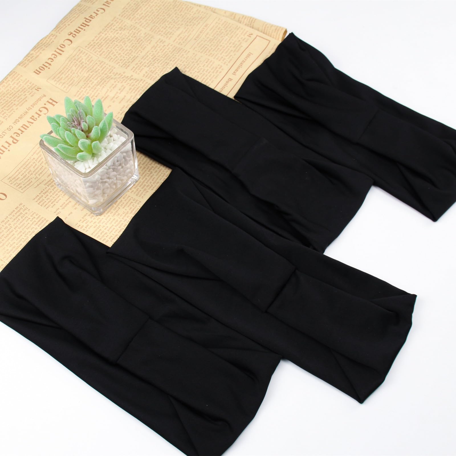 Carede cinta deportiva negra, ideal para yoga o correr con buena absorción.