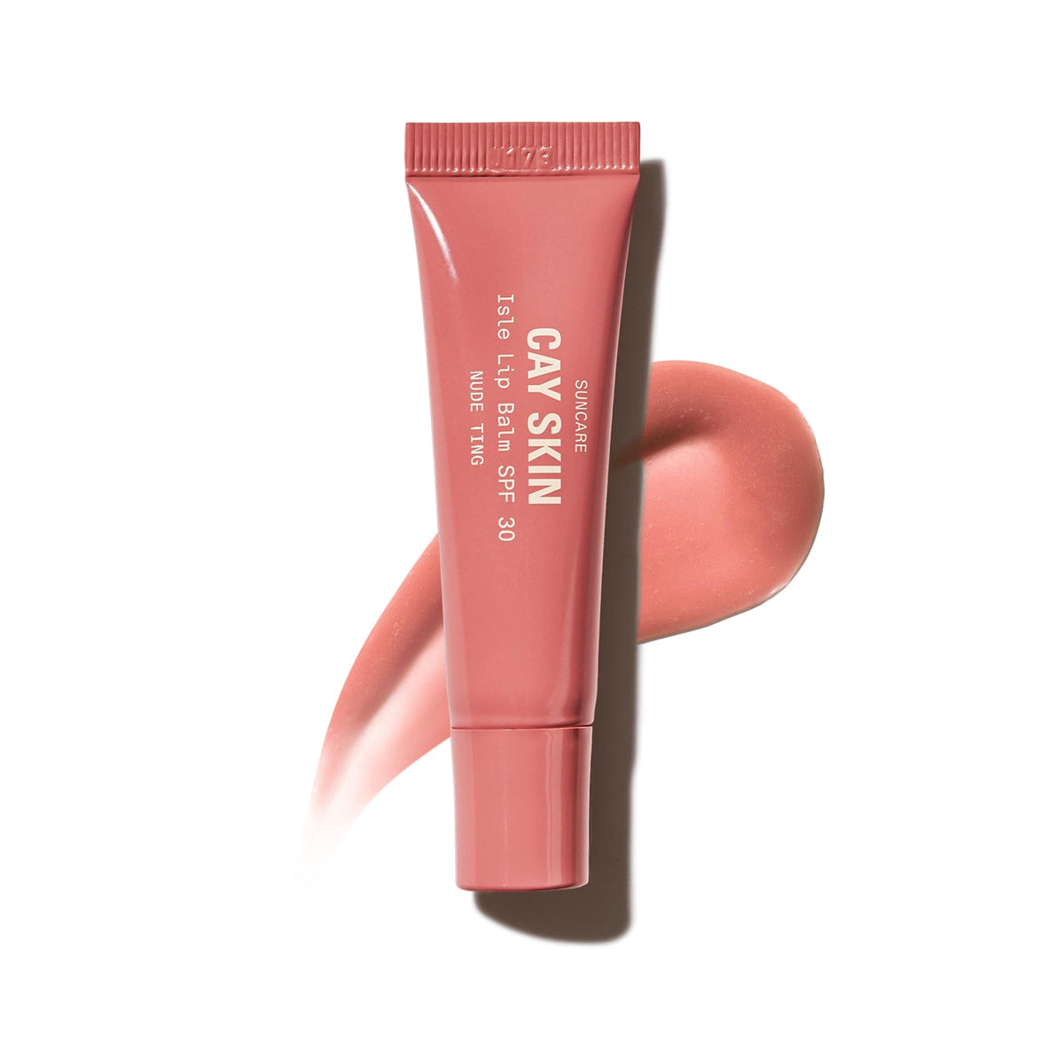 Cay Skin Isle bálsamo labial SPF30 en envase brillo, hidratación duradera.