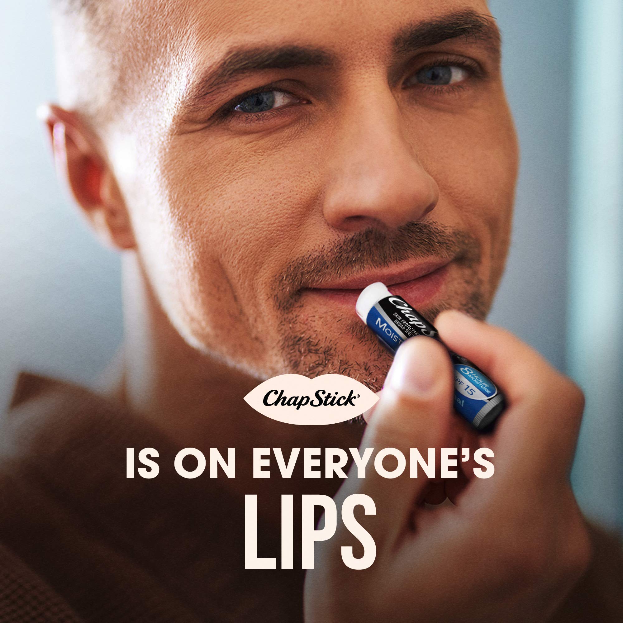 ChapStick Moisturizer 2-in-1 lipcare SPF15 tube in use on lips.