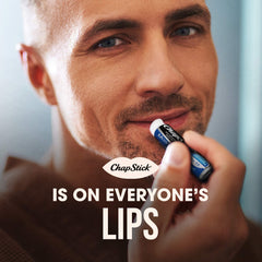 ChapStick Moisturizer 2-in-1 lipcare SPF15 tube in use on lips.