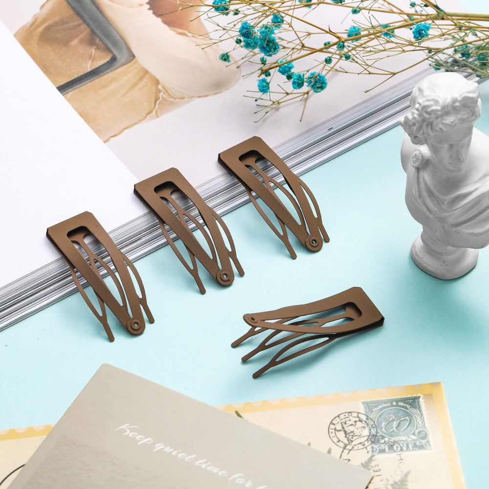 Pinza de pelo Chinco de dos pulgadas, ideal para peinados rápidos.