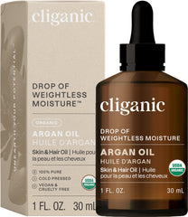 Cliganic Aceite de Argán Orgánico, botella, nutre cabello y piel con absorción suave.