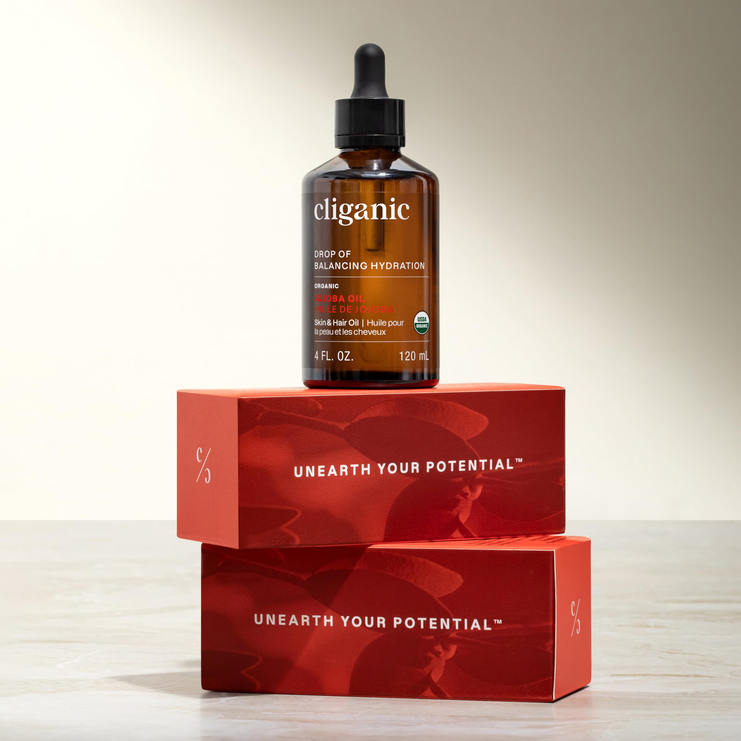 Cliganic Aceite de Jojoba Orgánico 4oz empaque sostenible y práctico.