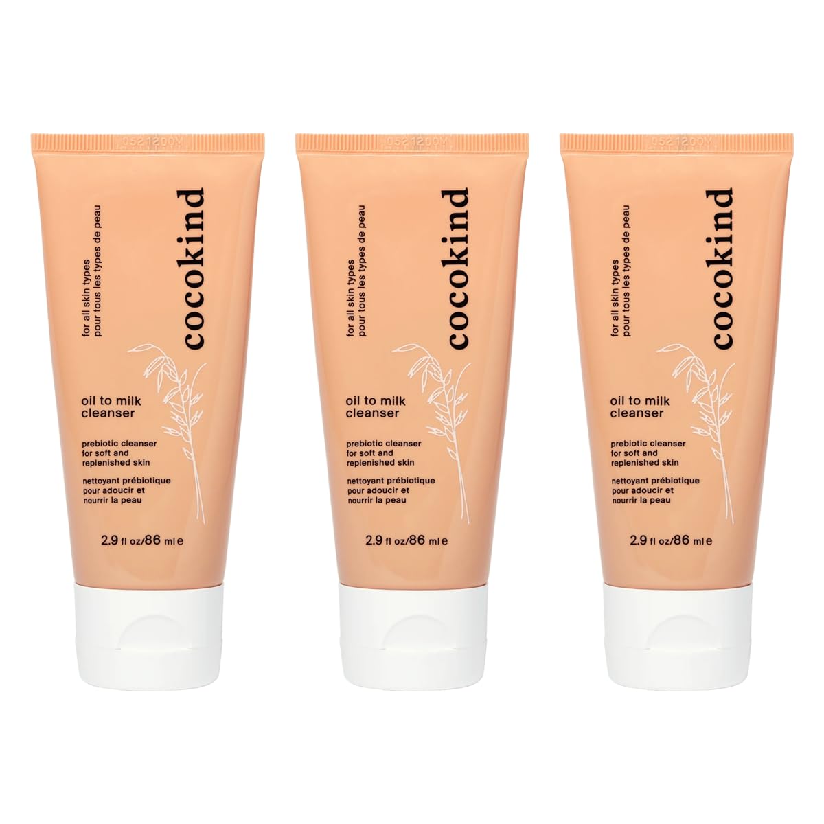 Cocokind limpiador aceite-leche textura cremosa para limpieza suave.