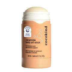 Cocokind Ceramide Body Oil Stick, frente del envase, hidratación suave para piel sensible.