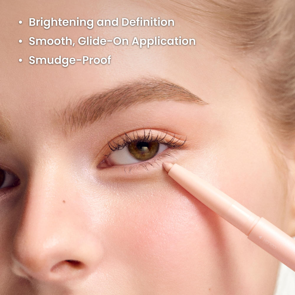 COLORGRAM Under Eye Highlighter Stick in warm peach with a creamy, lightweight formula.
