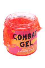 Combat Gel extremo-sosten 500 ml papaya, fijación duradera para peinados definidos.