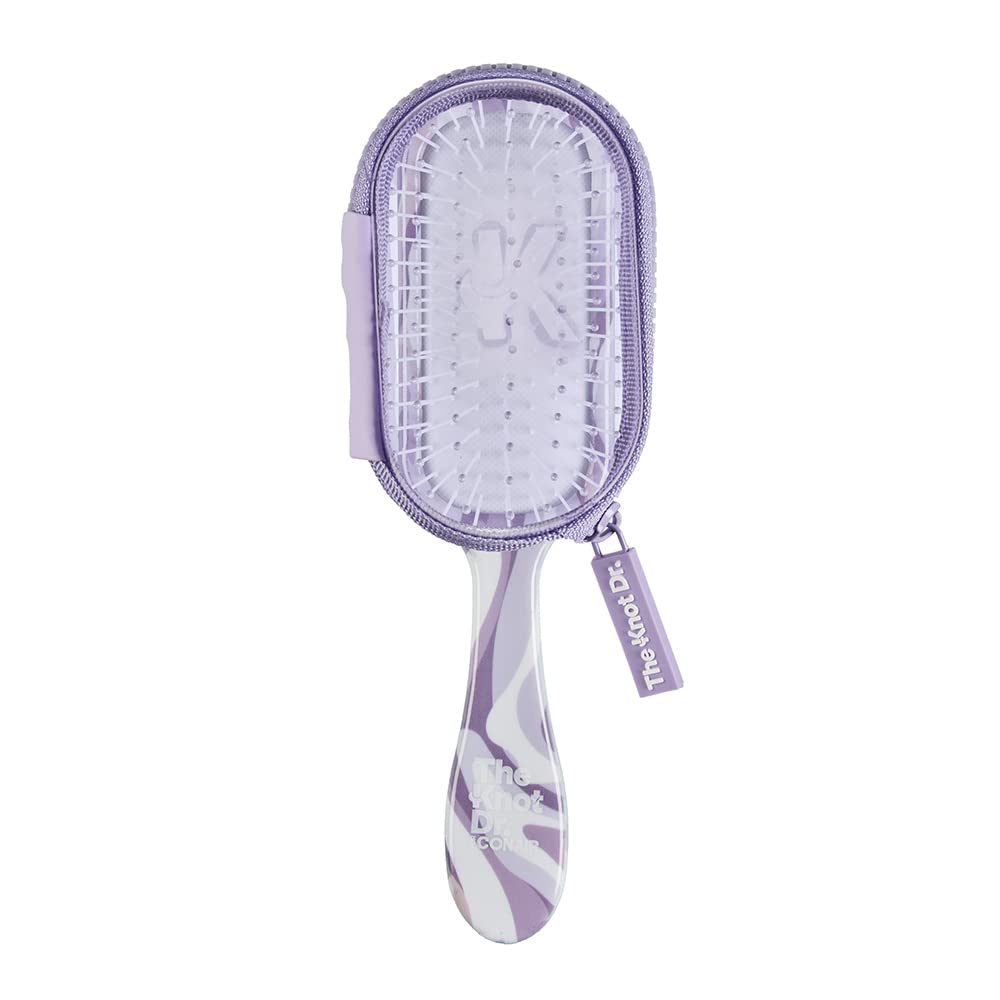 Cepillo Knot Dr. de Conair morado desenredante para cabello mojado o seco, desenreda sin tirar.