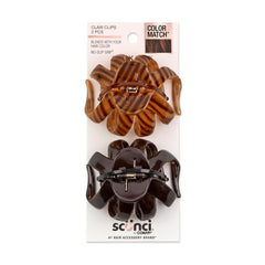 Pinza Scünci garra pulpo negro-carey vista frontal para recogidos rápidos.