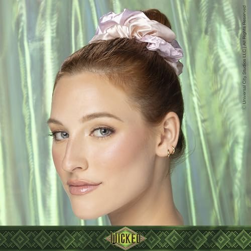 Diadema de cuero sintético rosa Conair Wicked Glinda añade brillo suave.