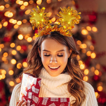 Coridy diadema con luces para fiestas con brillo dorado.