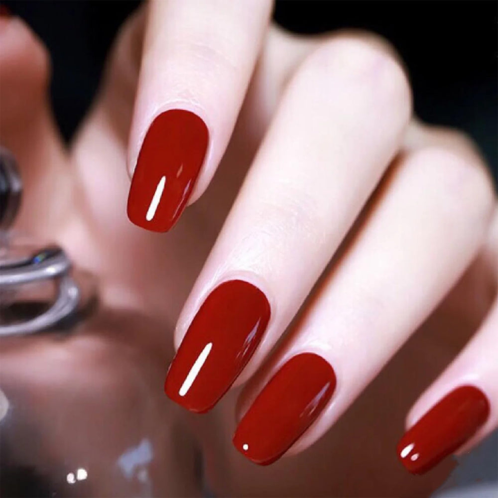 COSMOO Esmalte rojo, advertencia de alergias para uso seguro.