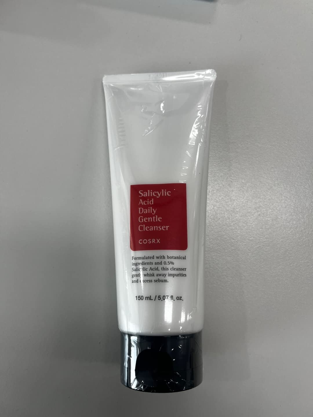 COSRX espumoso limpiador facial suave, textura cremosa para uso diario.