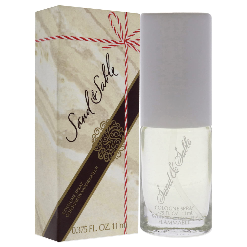 Coty Sand y Sable atomizador para aplicación suave y precisa.