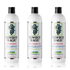 Cowboy Magic Champú: botella clara y textura satinada que sugiere suavidad.