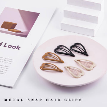 Clip corazón de metal beige brillante de Cptots, ideal para recogidos ligeros y look natural
