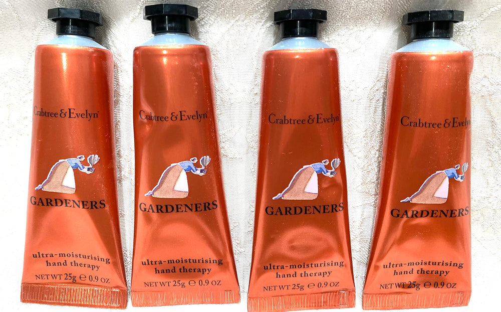 Crabtree & Evelyn, crema para manos en tubo; enfoque en envase, hidrata para uso diario.