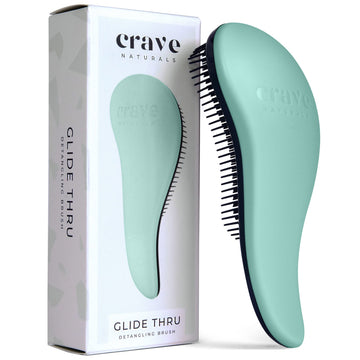 Crave Naturals Glide Thru en turquesa, desenreda nudos con suavidad.
