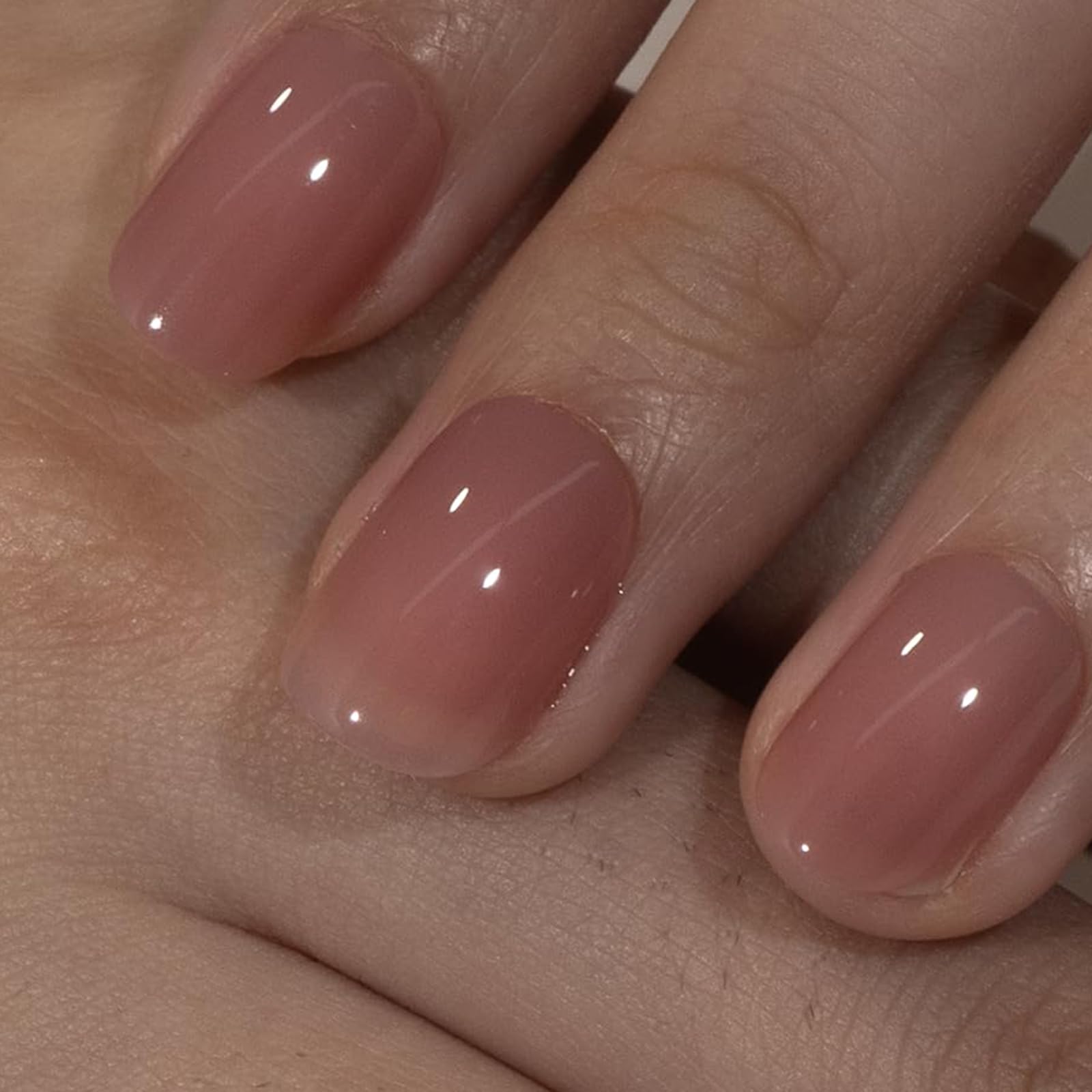 Curvlife uñas rosa durazno oval con diseño para un acabado elegante
