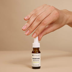 Envase de 15 mL de Dazzle Dry, práctico para tu rutina diaria.