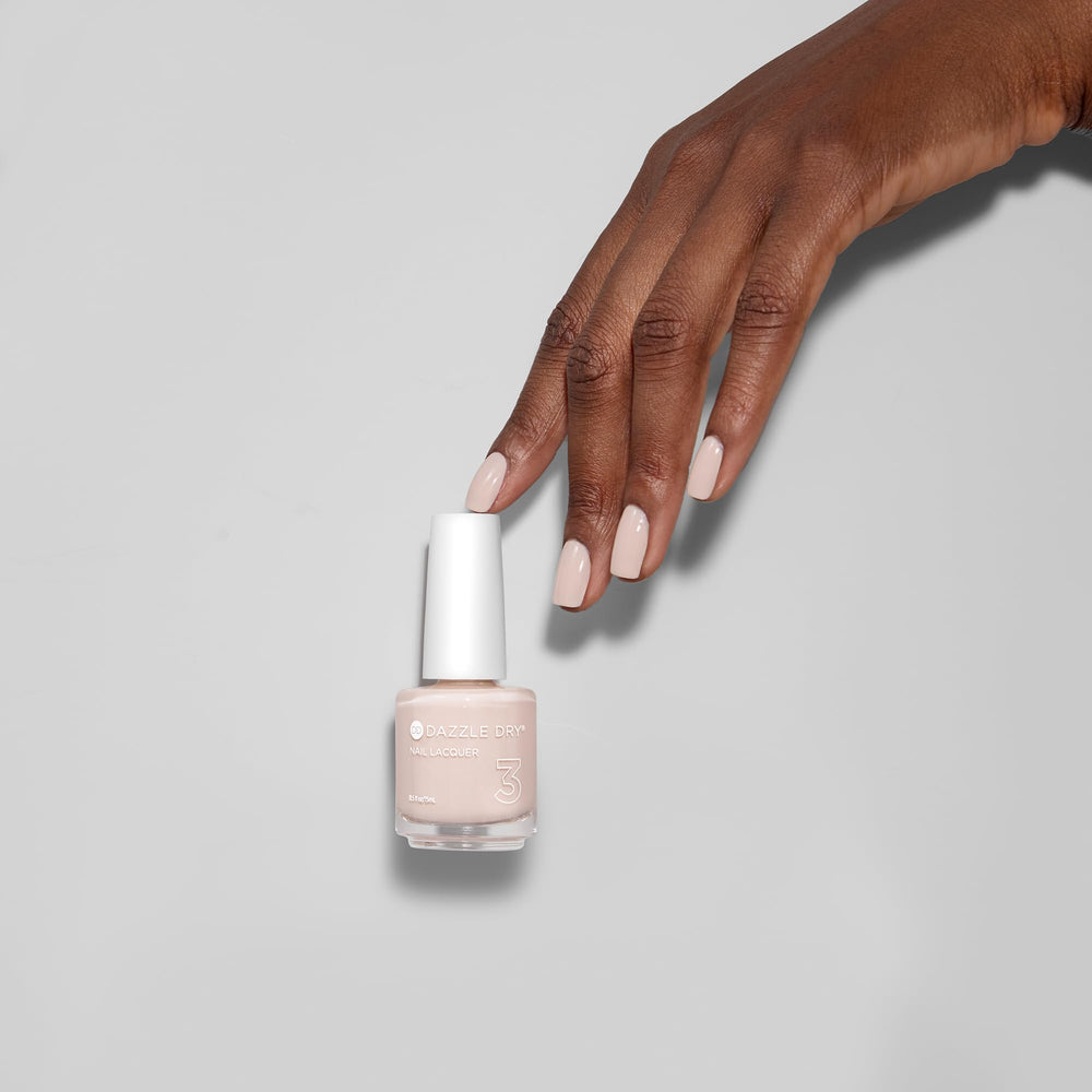 Sistema de cuatro pasos de Dazzle Dry para manicure de salon en casa
