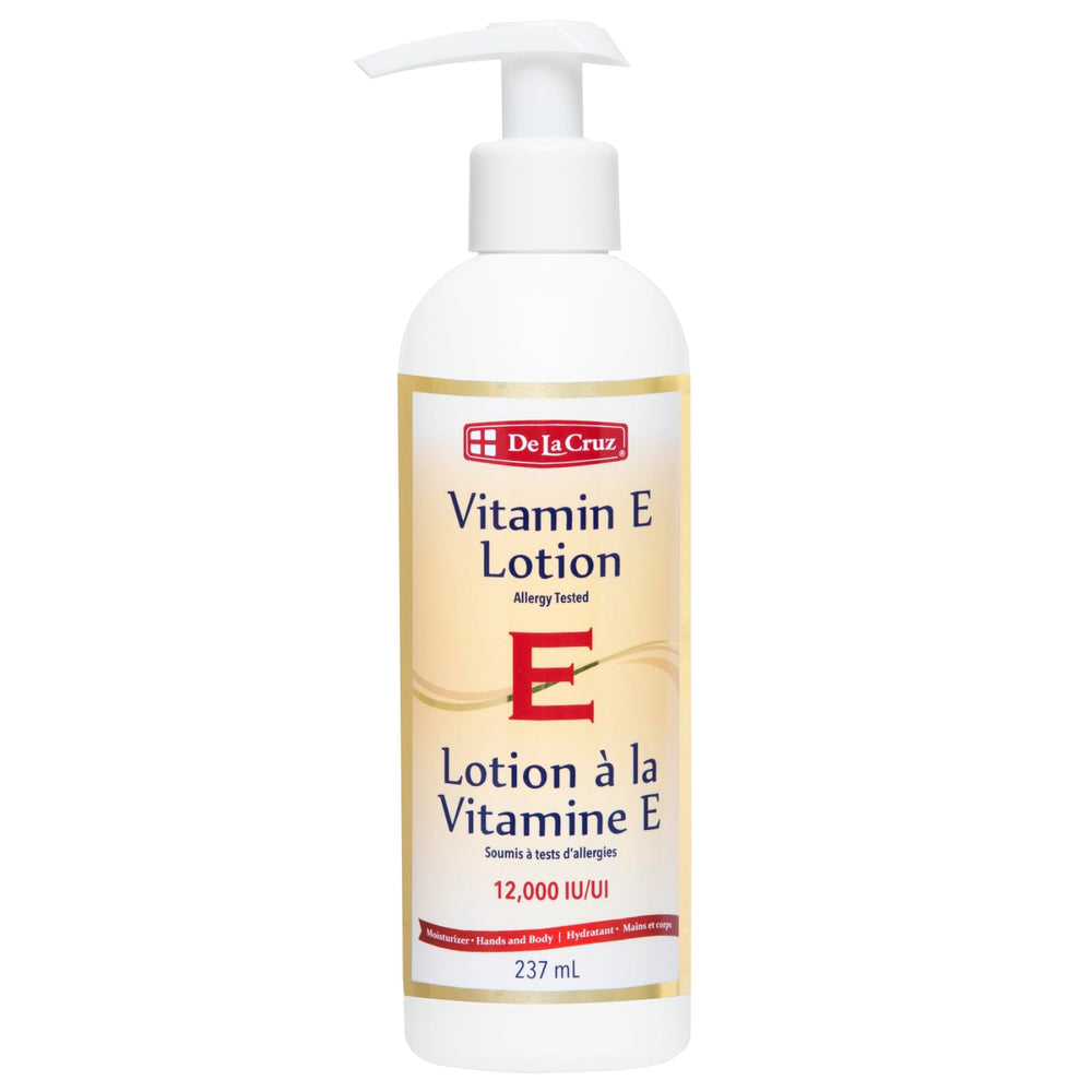 De La Cruz Vitamin E Lotion, botella frontal, piel suave e hidratada