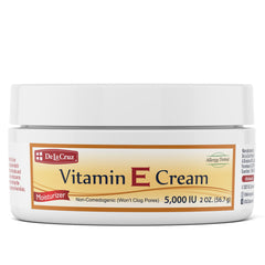 De La Cruz Vitamina E Crema, bote frontal, hidratación suave para piel seca.