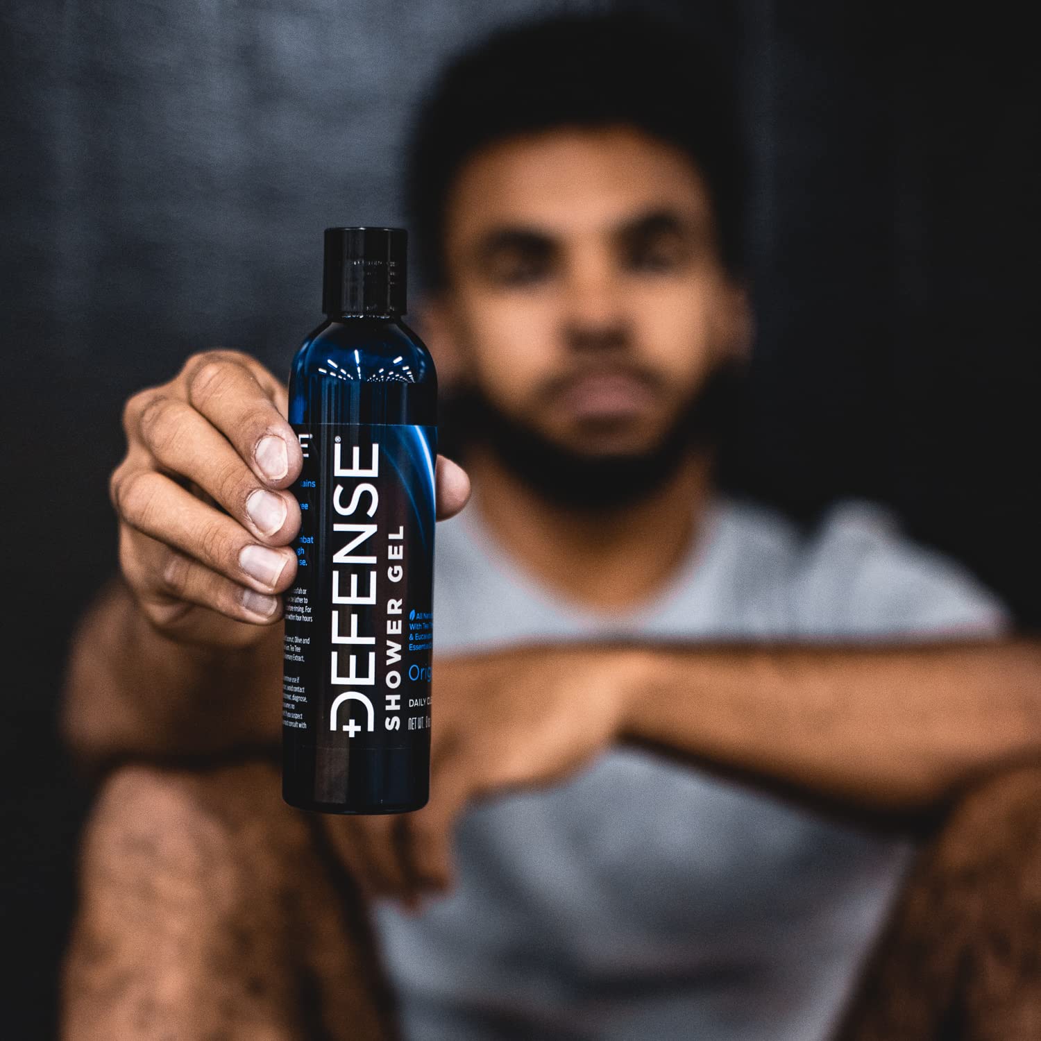Defense Soap Tea Tree Body Wash athlete using after workout routine.