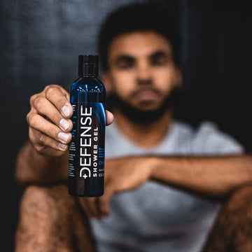Defense Soap Tea Tree Body Wash athlete using after workout routine.