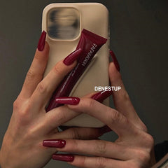 DENESTUP Lip Jam wand applying for a smooth, lightweight finish
