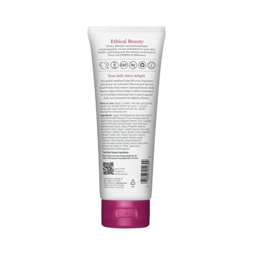 Derma E exfoliante con carbón activado, textura oscura que absorbe impurezas.