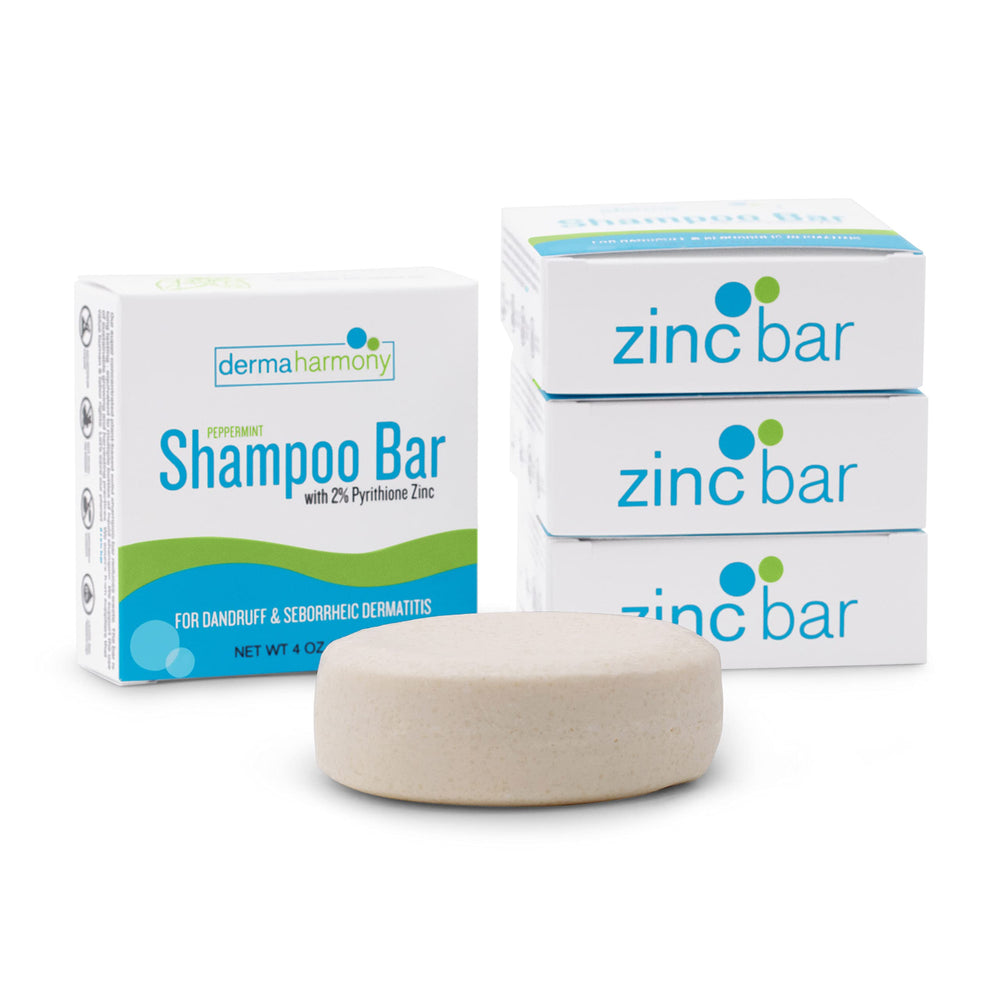 DermaHarmony shampoo bar being applied to hair for cleansing.