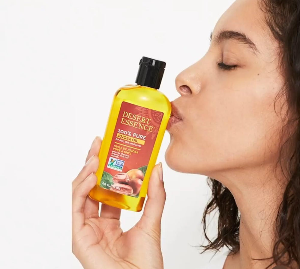 Desert Essence Aceite de Jojoba para masajes faciales con deslizamiento suave.