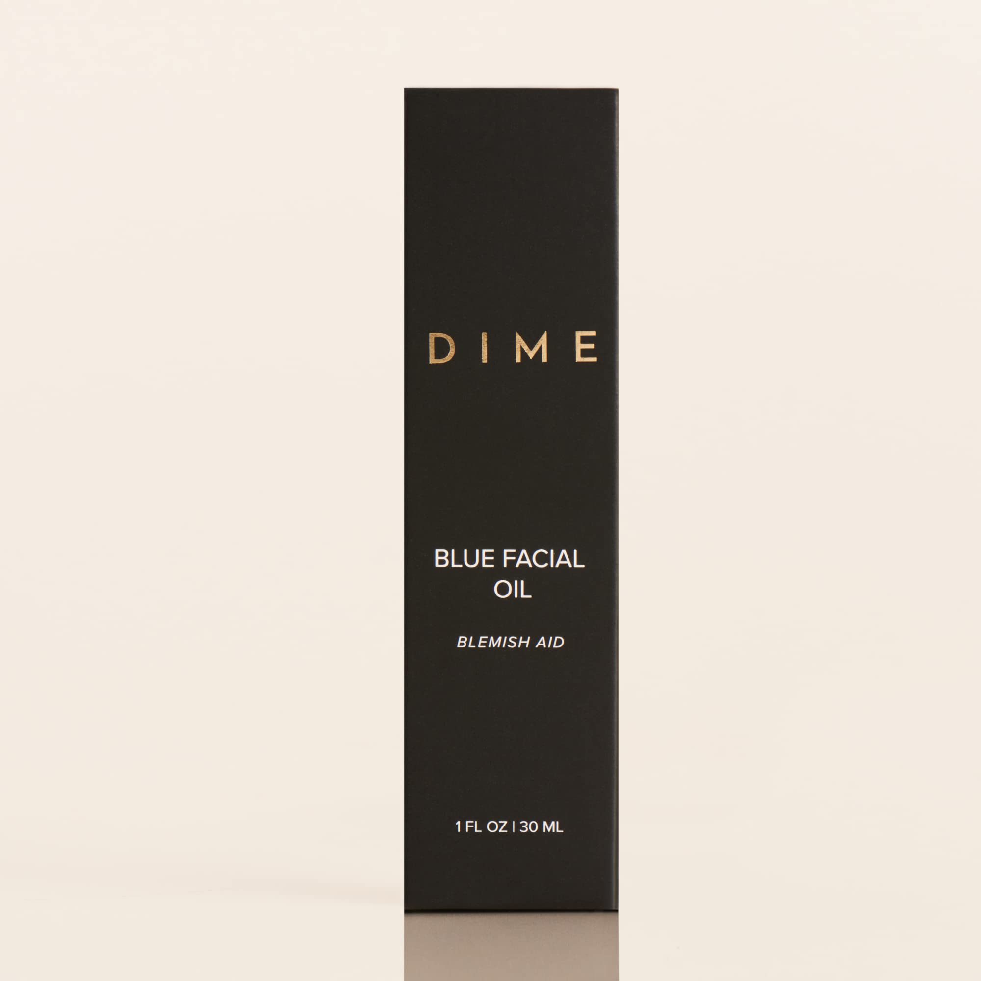 DIME Aceite facial azul: presentación sostenible y envase responsable.