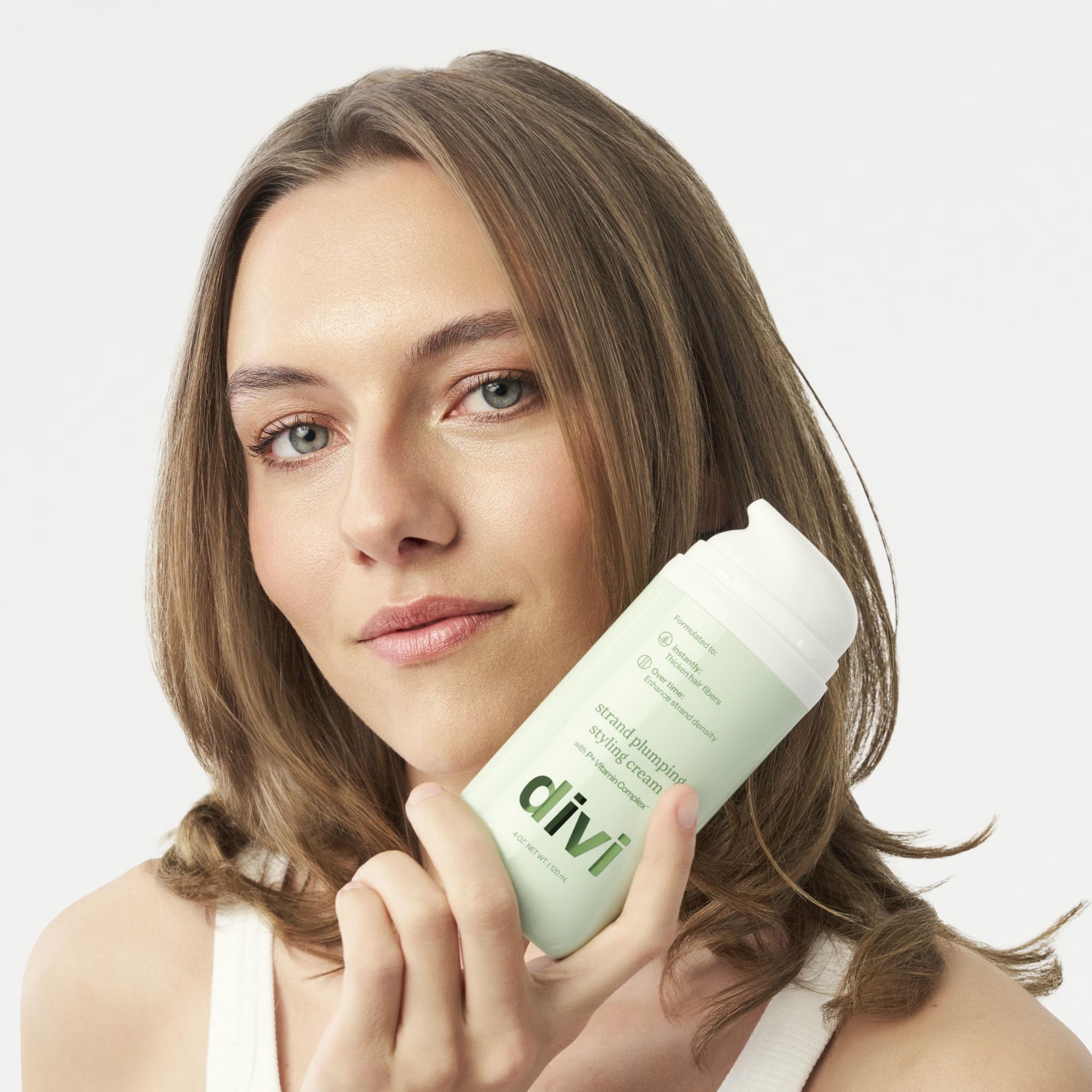 Divi Strand Crema de Peinado, protección térmica integrada durante el peinado.