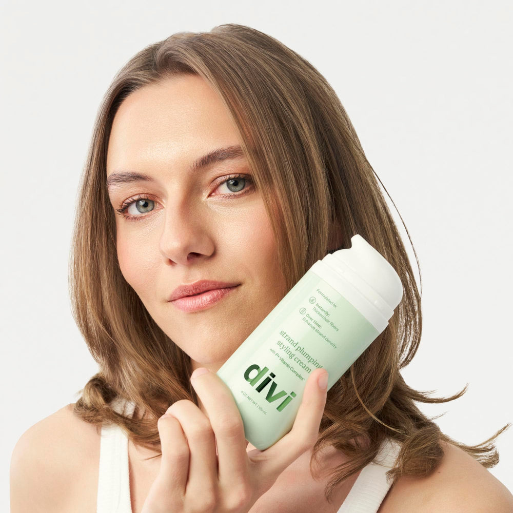 Divi Strand Crema de Peinado, protección térmica integrada durante el peinado.