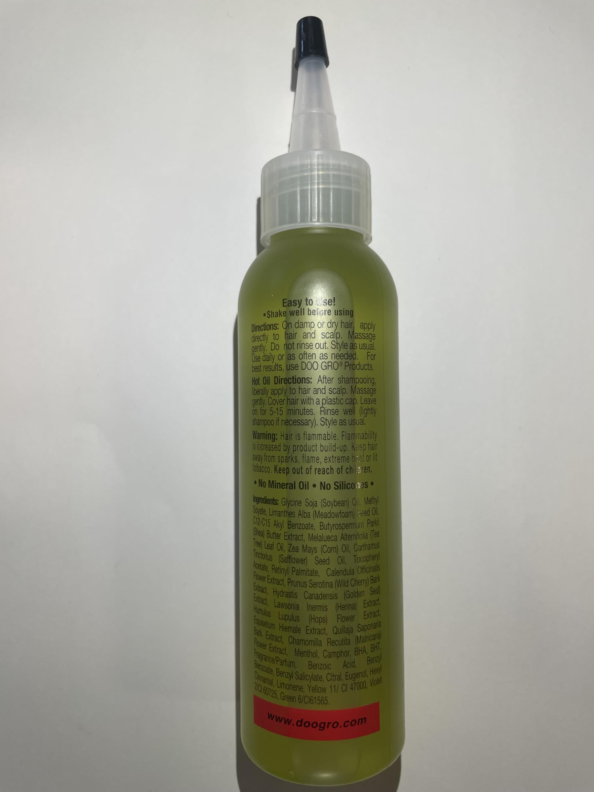 Doo Gro Aceite de Crecimiento Anticomezón, etiqueta detallada, información clara para uso seguro