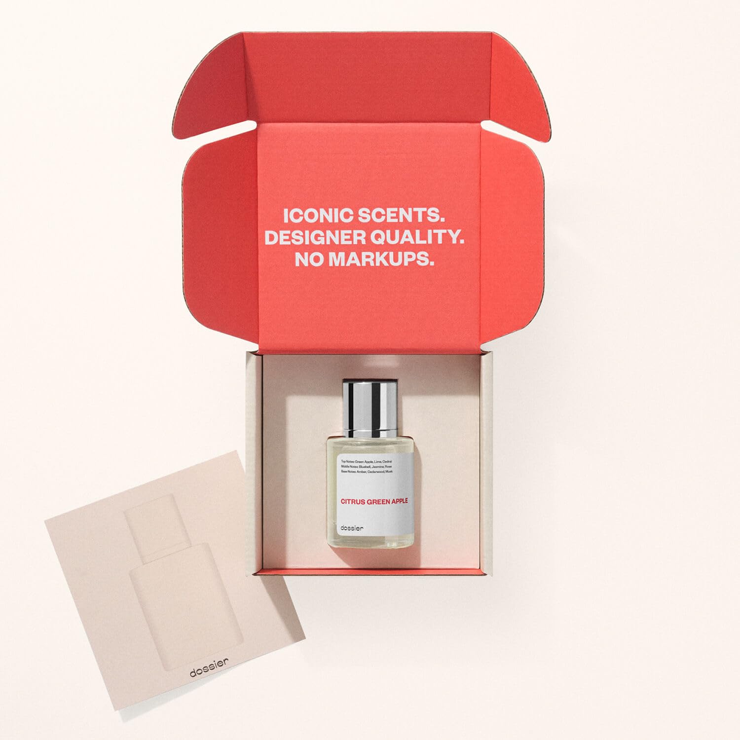 Dossier Citrus Green Apple bottle and box on a clean surface for travel-friendly appeal.