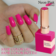 Double Rhythm gel rosa fucsia aplicándose con brocha para manicura suave.